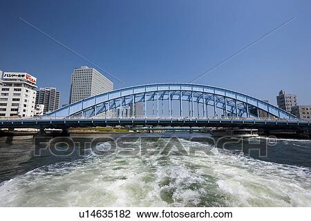 Stock Image - Sumida river and Eidai-bashi. Fotosearch