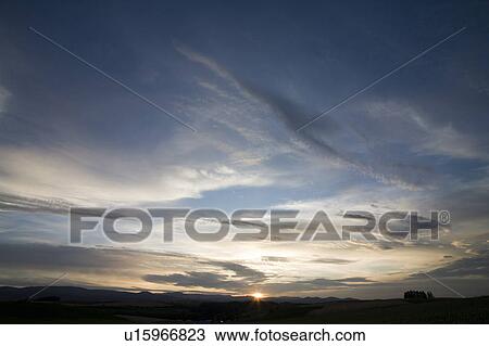 Sunrise over mountain range View Large Photo Image Stock Image - Sunrise over mountain range. Fotosearch