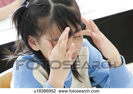 Tired girl at cram school View Large Photo Image Stock Image - Tired girl at cram school. Fotosearch