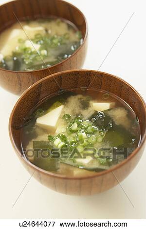 Tofu and seaweed in Miso soup, close up, white background View Large Photo Image Stock Photo - Tofu and seaweed in Miso soup, close up, white background. Fotosearch