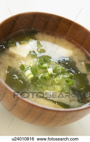 Tofu and seaweed in Miso soup, close up, white background View Large Photo Image Stock Photograph - Tofu and seaweed in Miso soup, close up, white background. Fotosearch