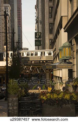 Train on elevated railroad View Large Photo Image Stock Photo - Train on elevated railroad. Fotosearch