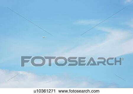 White Cloud and Airplane in Blue Sky, Hawaii, USA View Large Photo Image Stock Image - White Cloud and Airplane in Blue Sky, Hawaii, USA. Fotosearch