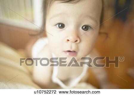Wide angle view of baby girl View Large Photo Image Stock Image - Wide angle view of baby girl. Fotosearch