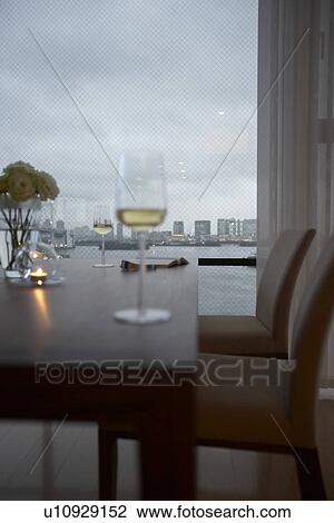 Stock Image - Wineglasses on table. Fotosearch