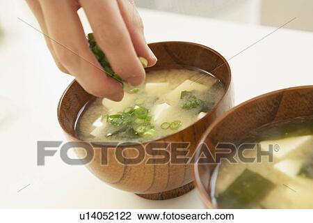 Woman making Miso soup, close up View Large Photo Image Stock Image - Woman making Miso soup, close up. Fotosearch