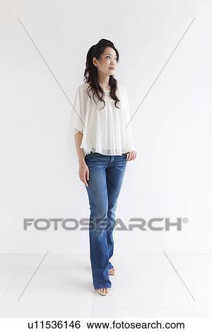 Woman standing View Large Photo Image Stock Photograph - Woman standing . Fotosearch