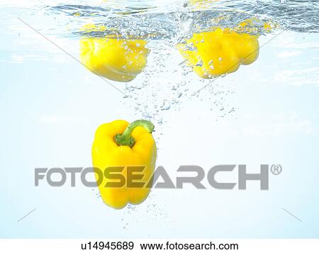 Stock Photo - Yellow paprika underwater. Fotosearch