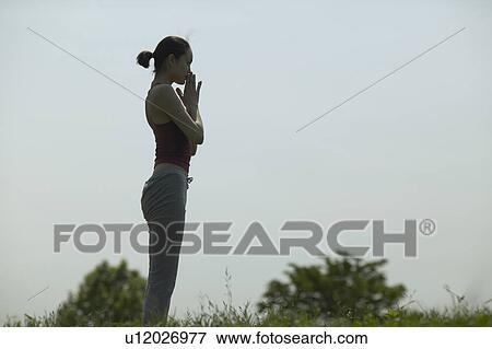 Young Woman Meditating View Large Photo Image Stock Photo - Young Woman Meditating. Fotosearch
