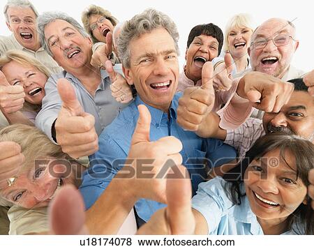 Stock Photo - A group of people giving the thumbs up sign. Fotosearch