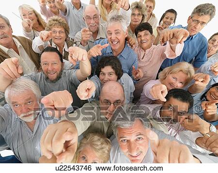 A group of people pointing up View Large Photo Image Stock Photograph - A group of people pointing up. Fotosearch