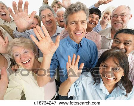 A group of people waving View Large Photo Image Stock Photo - A group of people waving. Fotosearch