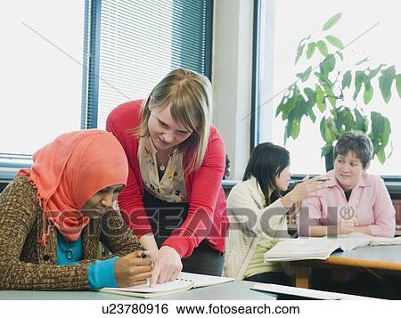 Adults students learning English as a second language View Large Photo Image Stock Photograph - Adults students learning English as a second language. Fotosearch
