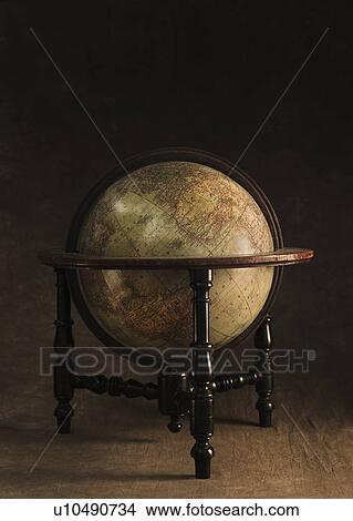 Picture - Antique globe and stand. Fotosearch