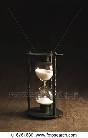 Stock Image - Antique sand timer. Fotosearch