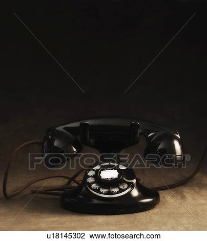 Stock Image - Antique telephone. Fotosearch