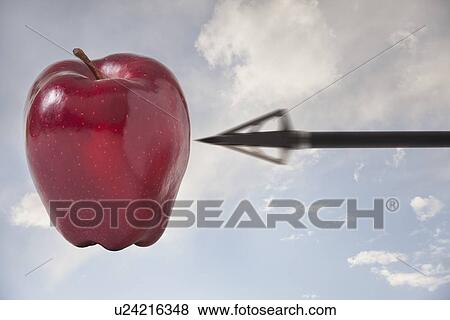Stock Photo - Arrow pointing at apple in the sky. Fotosearch