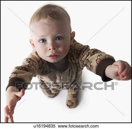 Stock Photography - Baby reaching up. Fotosearch