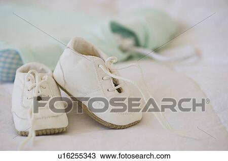 Stock Image - Baby shoes. Fotosearch