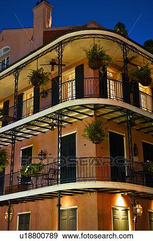 Stock Photo - Balconies at night in French Quarter of New Orleans. Fotosearch