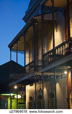 Stock Photograph - Balconies at night in French Quarter of New Orleans. Fotosearch