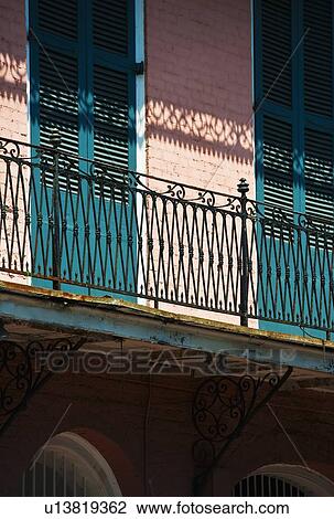 Stock Image - Balconies on building in the French Quarter of New Orleans. Fotosearch