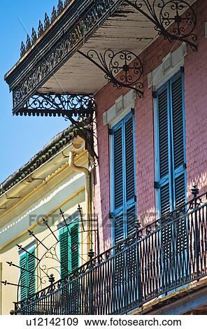 Balconies on building in the French Quarter of New Orleans View Large Photo Image Stock Photo - Balconies on building in the French Quarter of New Orleans. Fotosearch
