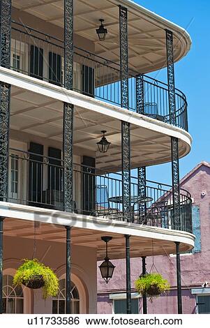 Balconies on building in the French Quarter of New Orleans View Large Photo Image Stock Photograph - Balconies on building in the French Quarter of New Orleans. Fotosearch