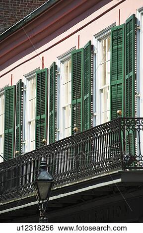 Balcony and windows with green shutters View Large Photo Image Stock Photograph - Balcony and windows with green shutters. Fotosearch