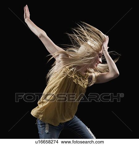 Picture - Blond woman dancing. Fotosearch
