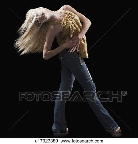 Blond woman dancing View Large Photo Image Stock Photo - Blond woman dancing. Fotosearch