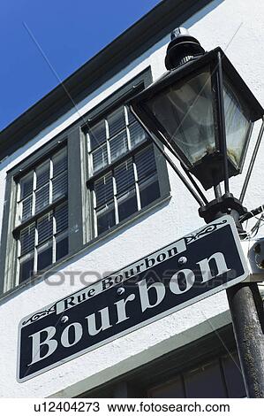 Stock Image - Bourbon Street sign and Lamp post. Fotosearch