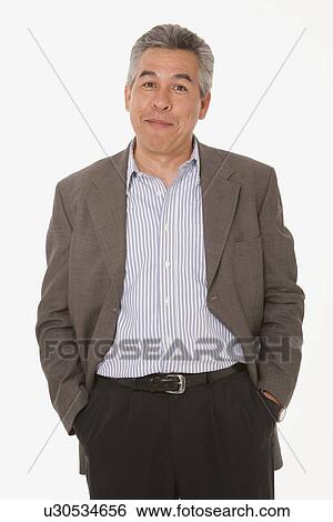 Stock Photograph - Businessman with his hands in his pockets. Fotosearch