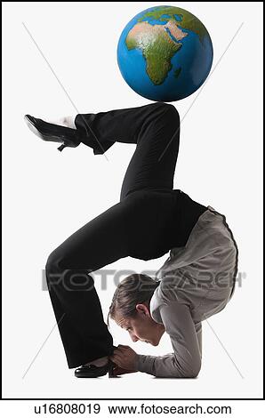 Stock Photo - Businesswoman bending over backwards. Fotosearch