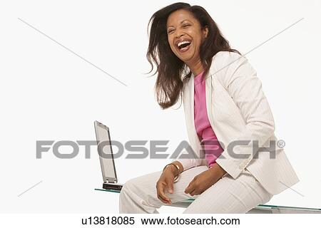 Businesswoman laughing View Large Photo Image Stock Photography - Businesswoman laughing. Fotosearch