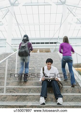 Stock Photo - College students on steps in front of library. Fotosearch