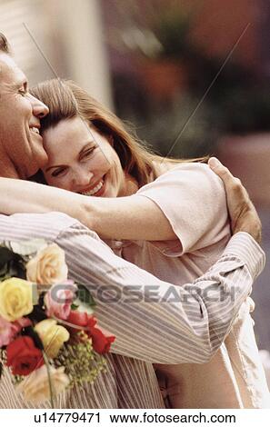 Couple hugging View Large Photo Image Stock Image - Couple hugging. Fotosearch