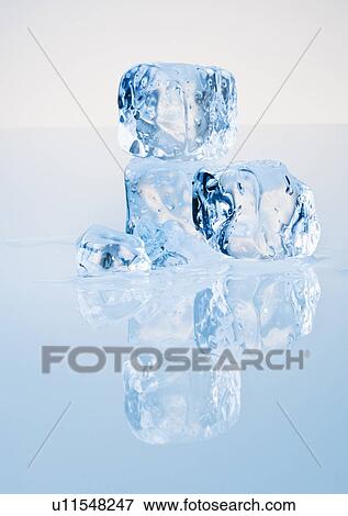 Cubes of melting ice View Large Photo Image Stock Photo - Cubes of melting ice. Fotosearch