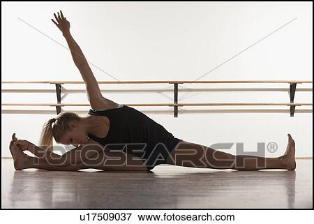 Dancer stretching View Large Photo Image Stock Photo - Dancer stretching. Fotosearch