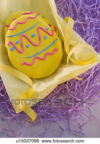 Stock Photo - Decorated chocolate Easter egg. Fotosearch