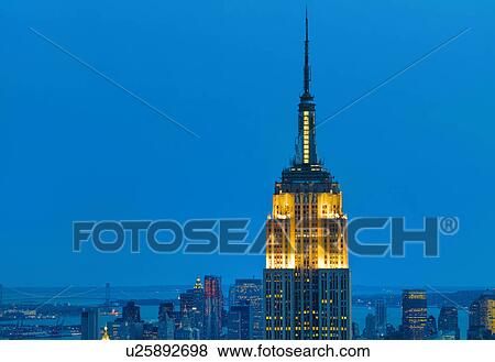 Stock Photo - Empire State building at sunset. Fotosearch