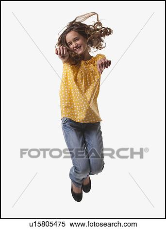 Excited teenage girl jumping for joy View Large Photo Image Stock Photography - Excited teenage girl jumping for joy. Fotosearch