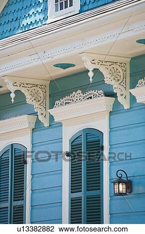 Stock Image - Exterior of blue house in New Orleans. Fotosearch