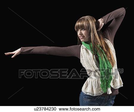 Female dancer performing lyrical dance View Large Photo Image Stock Image - Female dancer performing lyrical dance. Fotosearch
