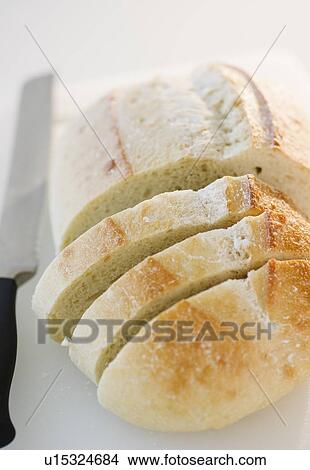 Freshly sliced bread View Large Photo Image Picture - Freshly sliced bread. Fotosearch