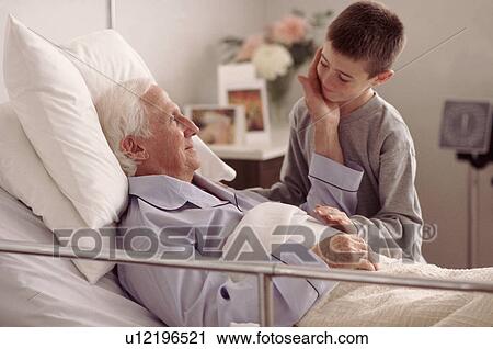 Grandson visiting Grandfather in hospital View Large Photo Image Stock Image - Grandson visiting Grandfather in hospital. Fotosearch