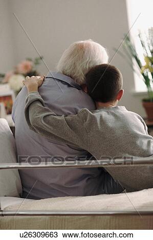 Grandson visiting Grandfather in hospital View Large Photo Image Stock Image - Grandson visiting Grandfather in hospital. Fotosearch