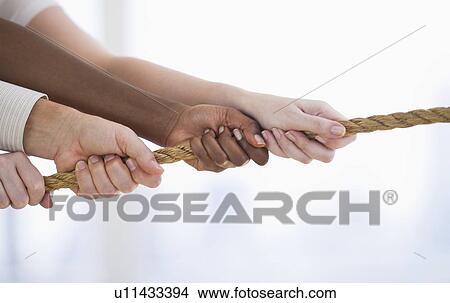 Picture - Hands pulling rope. Fotosearch