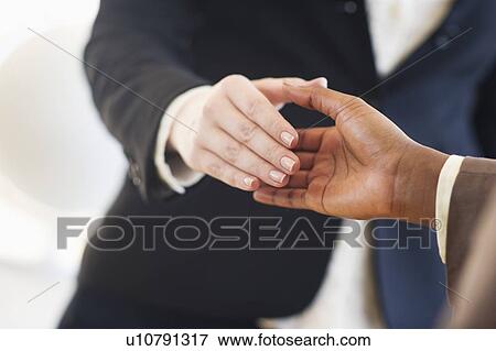 Stock Photo - Handshake. Fotosearch