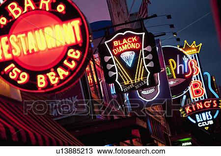 Illuminated bar signs on Beale Street in Memphis View Large Photo Image Stock Image - Illuminated bar signs on Beale Street in Memphis. Fotosearch